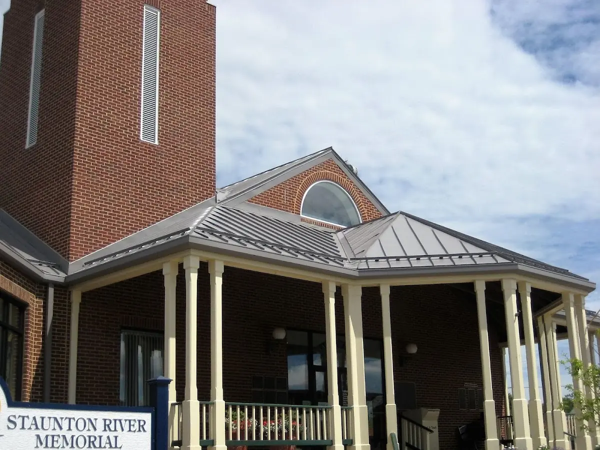 Skilled roofing craftsmen working on a residential roof in Draketown